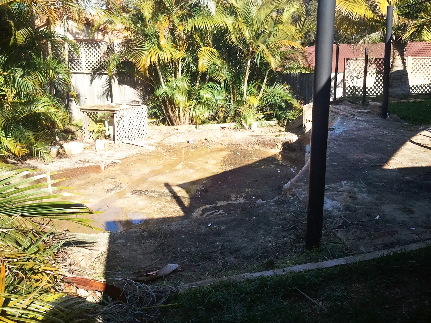 The bare backyard before work began