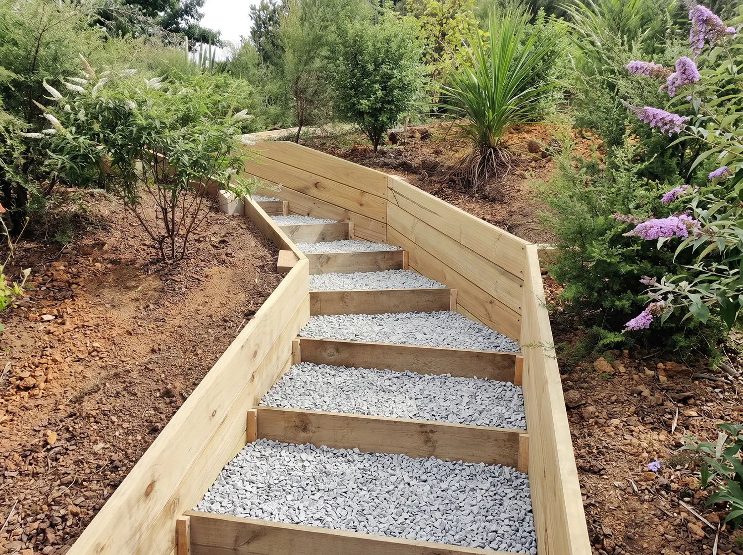 Timber stairway with retaining either side