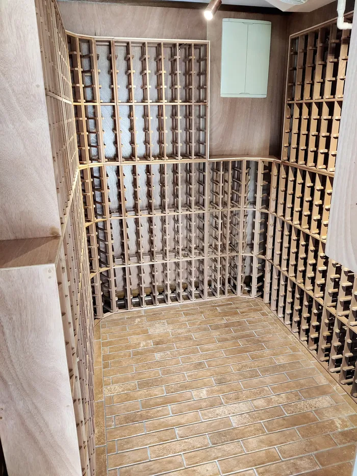 Custom wine cellar with curved racking